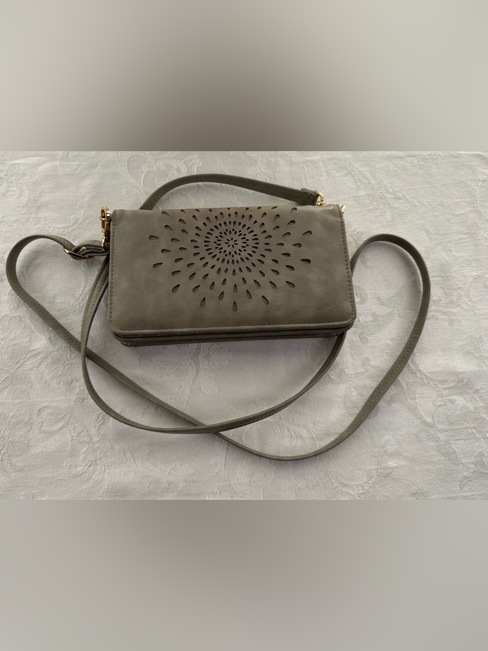 Forever Young Gray Crossbody Bag with Laser-Cut Sunburst Design